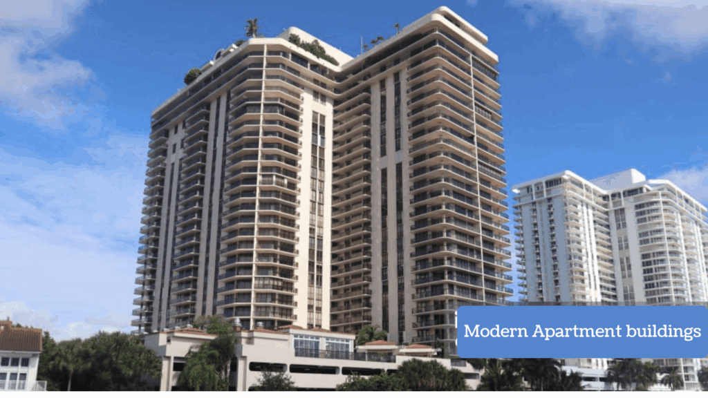Treasure at Tampines Condo: High-rise modern apartment buildings under clear blue sky