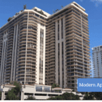 Treasure at Tampines Condo: High-rise modern apartment buildings under clear blue sky