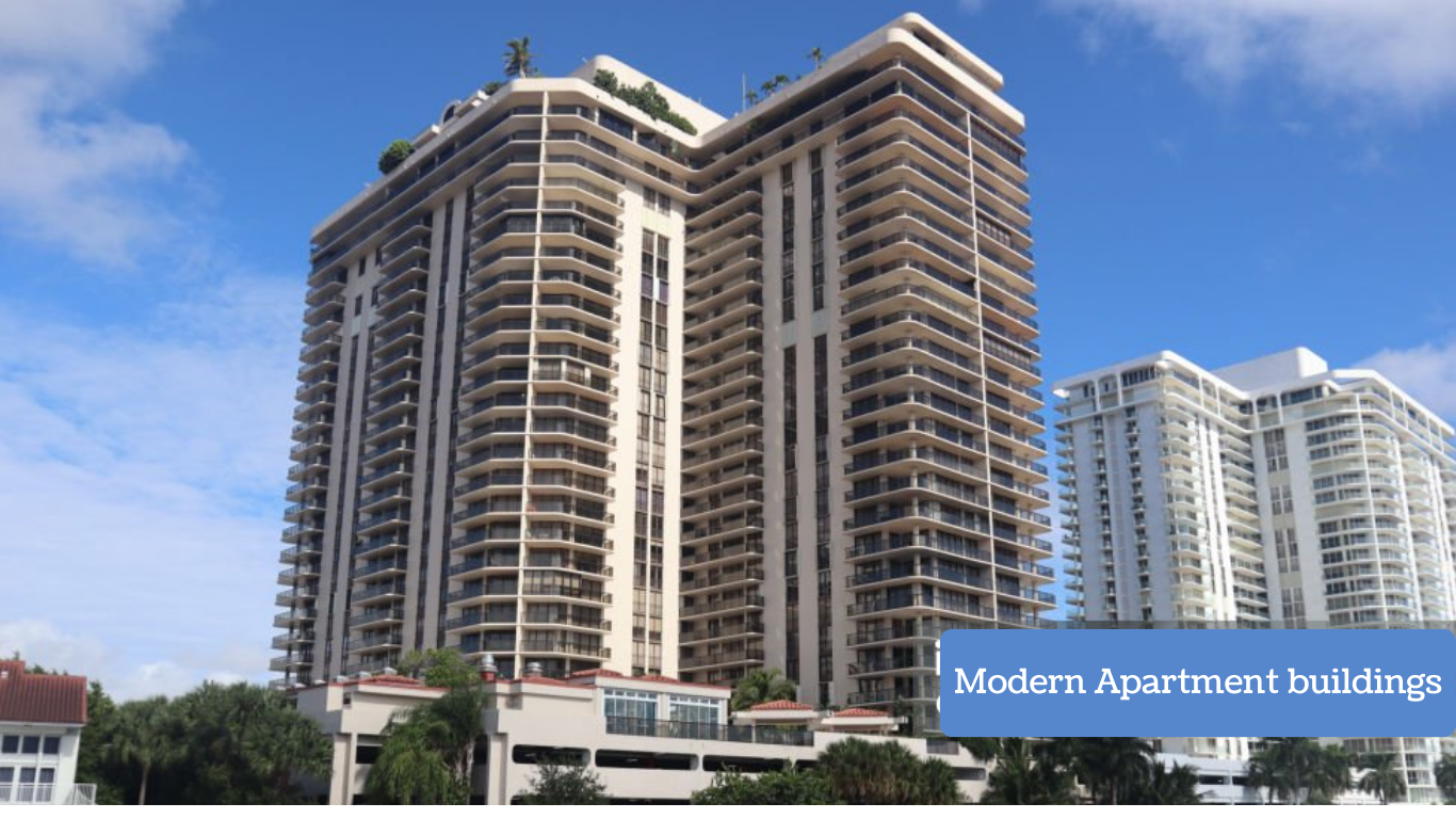 Treasure at Tampines Condo: High-rise modern apartment buildings under clear blue sky